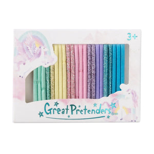 A pack of 25 multicolored hair ties presented in a box with the brand name 'Great Pretenders' on the top. The hair ties are visible in a variety of colors including blue, pink, purple, and green, each with a sparkly or shimmering design.