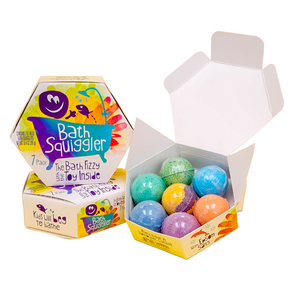 A product image featuring a colorful package labeled 'Bath Squiggler' with seven bath bombs visible inside. The package is open, displaying bath bombs in various colors, and the background is orange.