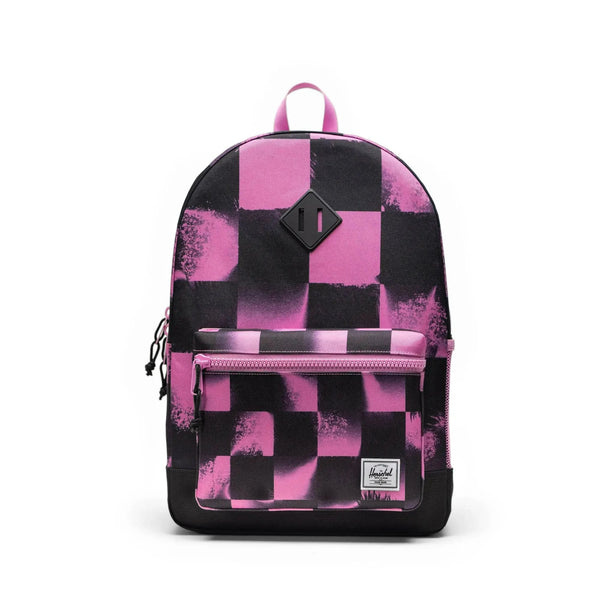 Backpack with pink and black checkered pattern on a white background