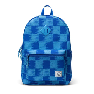 A Herschel Heritage Youth backpack in blue with green and red accents, featuring multiple pockets and a branded shoulder tab.