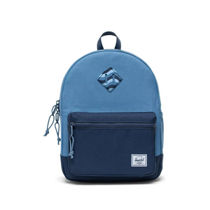 Blue backpack with a brand logo on a white background