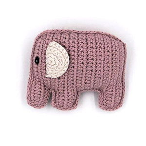 Knitted pink elephant toy on a white background