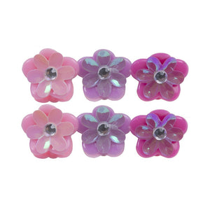 A set of six mini hair clips in pink, purple, and magenta with gem center details.