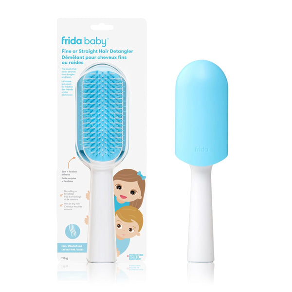 Frida baby hair detangler with blue bristle head and white handle on a white background