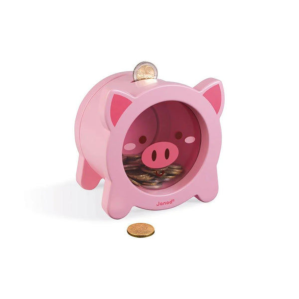 Pink piggy bank with coins on a white background
