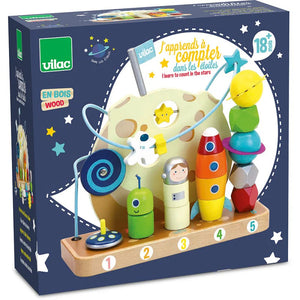 Vilac wooden toy set packaging with colorful elements and text