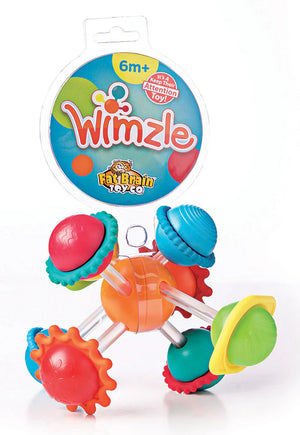 A colorful Wimzle toy with clustered geometric patterns designed for babies and toddlers. The toy is mainly red, blue, green, and yellow, and it is intended for 6 months+ age group.