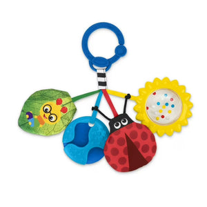 Colorful baby toy with ladybug, leaf, and flower design on a white background
