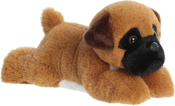 Plush toy dog lying down on a white background