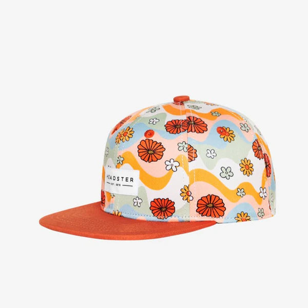 Colorful floral-patterned cap with orange brim on a white background