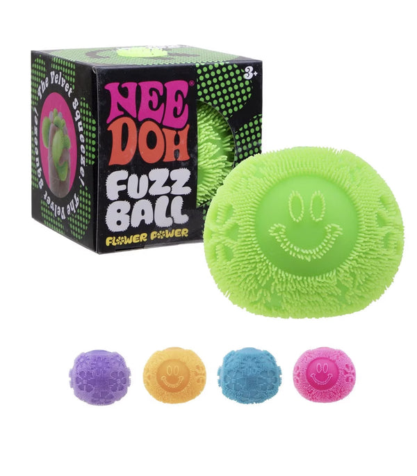 Green fuzz ball toy with packaging and additional colors displayed on a white background