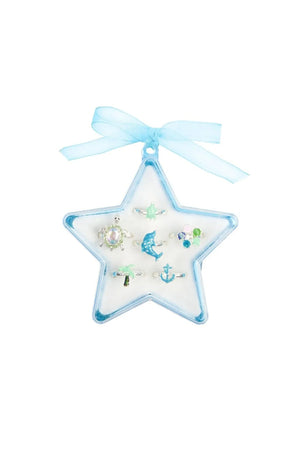 A set of six deluxe water-themed rings, including a baby green turtle, a larger turtle with gems, a glitter blue dolphin, gem flower, glitter palm tree, and a glitter anchor, presented in a blue star-shaped keepsake box with a blue organza ribbon.