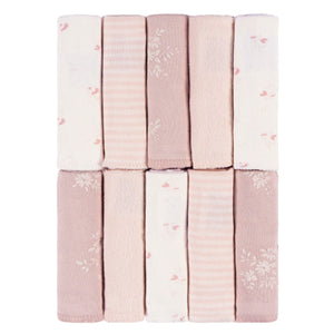 Set of folded fabric swatches in soft pink and beige tones on a white background