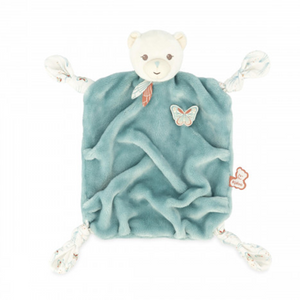 A green plush teddy bear with a small bear face and a blue bow, attached to a white ribbon with a butterfly and feathers.