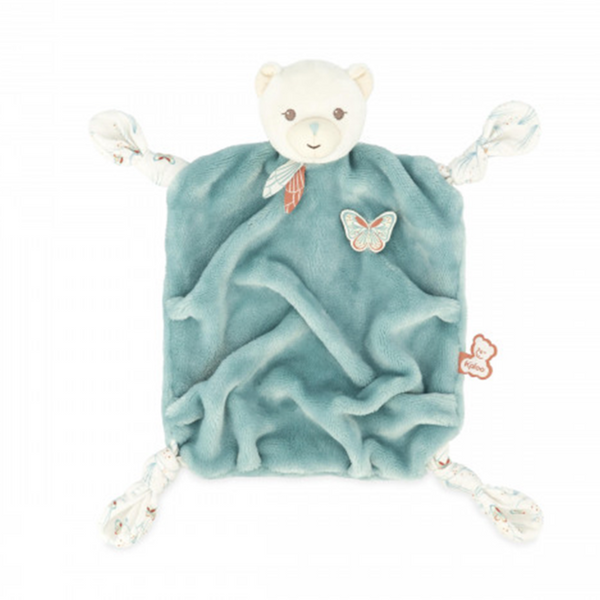 A green plush teddy bear with a small bear face and a blue bow, attached to a white ribbon with a butterfly and feathers.