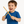Child holding drumsticks against a white background