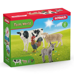 Packaging for a Schleich Farm World playset featuring illustrations of a cow, chicken, sheep, and a donkey on a green and red background.