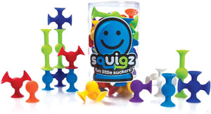Colorful squigz toys with packaging on a white background