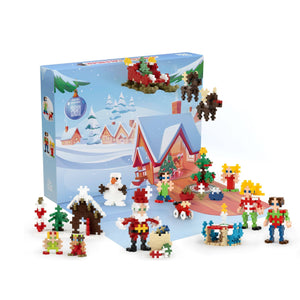A Plus Plus branded advent calendar with Christmas-themed pieces including Santa, reindeer, and holiday houses.