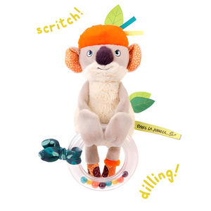 Plush toy koala with colorful elements on a white background