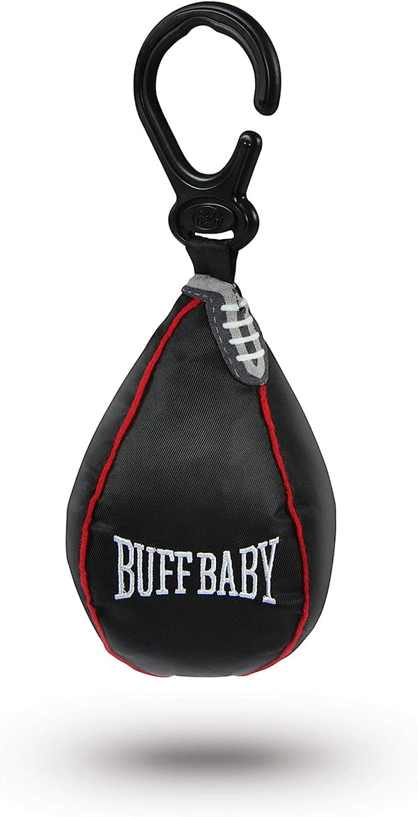 A miniature speed bag hanging toy with 'BUFF BABY' text, black with red accents, and a sensory crinkle layer, attached to a carabiner.