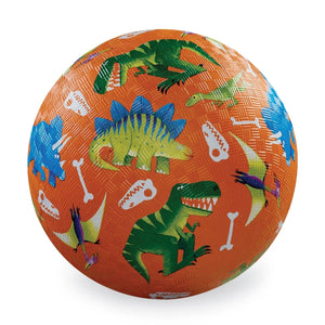 Colorful ball with dinosaur pattern on an orange background
