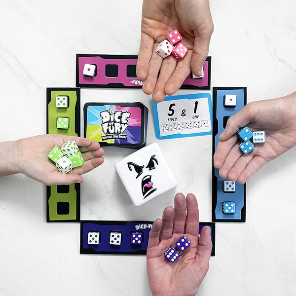 Hands holding dice and game cards with colorful packaging on a white background