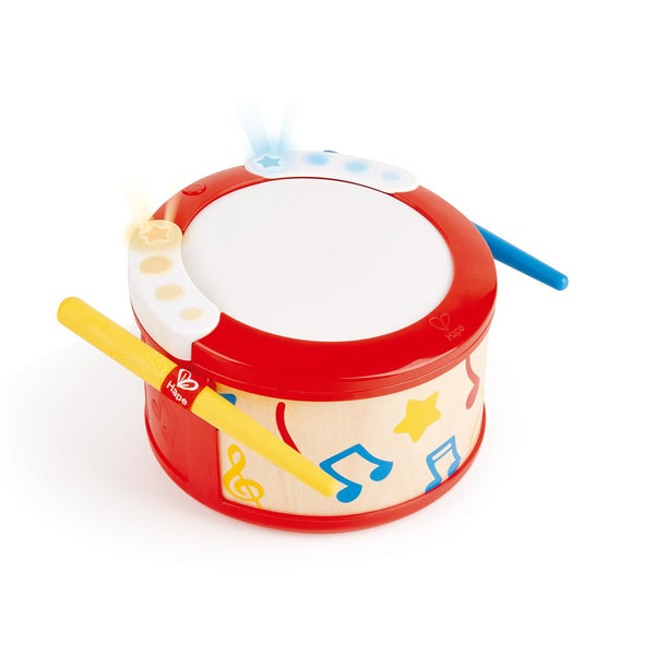 A colorful children's drum toy with red, yellow, and blue elements, including sticks and a musical note design.