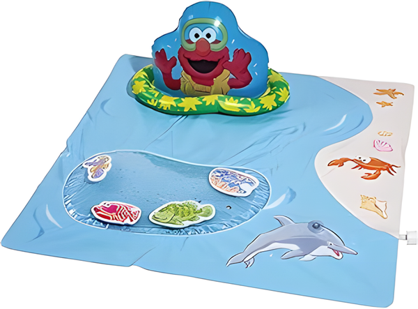 Children's toy with Elmo character on a blue mat with sea-themed graphics