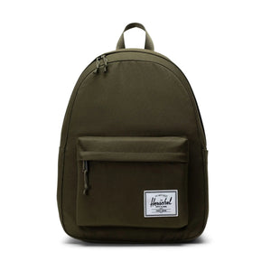 Green backpack with a visible brand logo on a white background