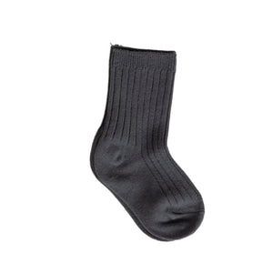 Gray sock on a beige background
