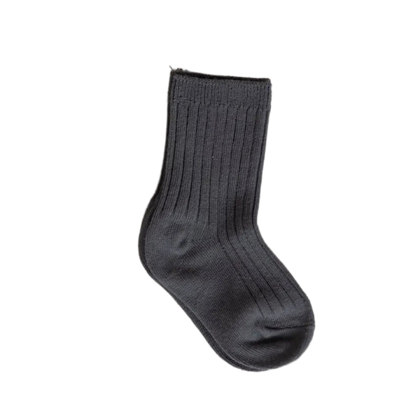 Gray sock on a beige background