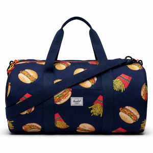 Navy duffel bag with food pattern on a white background