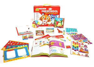 Educational preschool learning kit with books, stickers, and toys on a white background