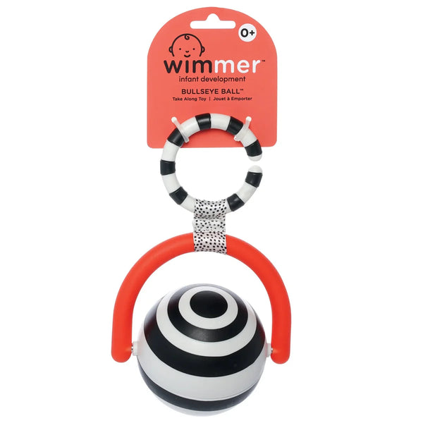 Black and white striped baby teething ball with red handle on a white background, featuring Wimmer branding.