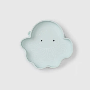 Light blue ghost-shaped object on a light gray background