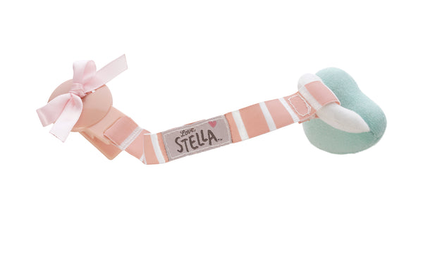 A pacifier and clip set with a pink and white color scheme, featuring a bow and the name 'Stella' embroidered on it.