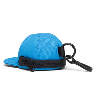 Blue cap with black strap on a white background
