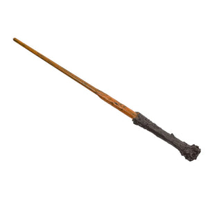 Wooden wand with a dark brown handle on a white background