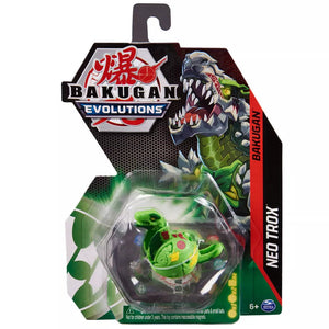 Packaged Bakugan Evolutions toy, featuring a green and yellow character in a clear plastic case with a label and artwork in the background.