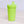 Green sippy cup on a light background
